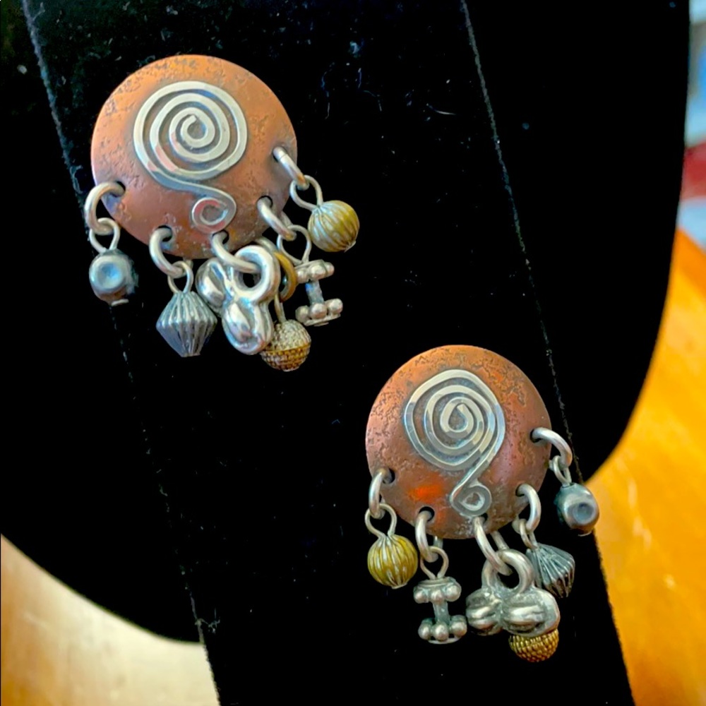 M. Baer designed sterling/brass earrings.